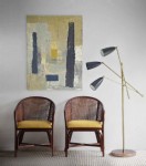 Deux fauteuils en rotin dossier canné