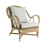 Fauteuil rotin vintage avec coussins