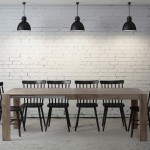 Grande table de salle à manger avec allonge et chaises à barreaux noires