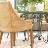 Fauteuil de table pieds en teck dossier en rotin